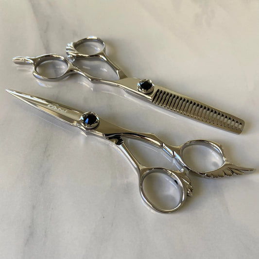 iCandy ANGEL Ice Black Diamond VG10 professional hairdressing scissors and thinning scissors bundle featuring premium Japanese VG10 steel, ergonomic offset handles, precision convex blades and an elegant black diamanté tension screw for professional hairdressers and barbers.