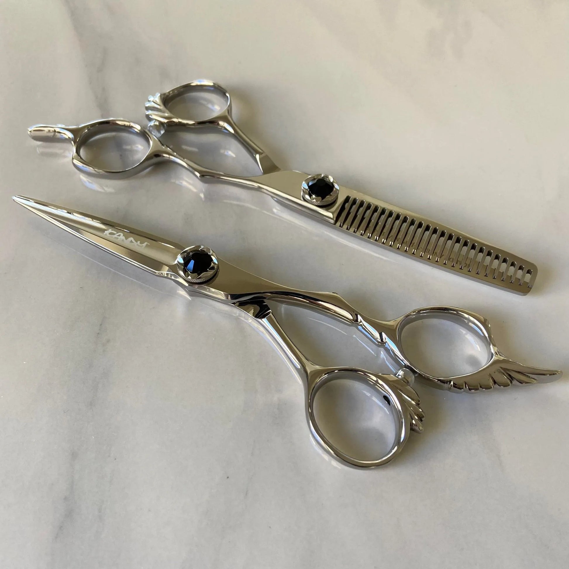 iCandy ANGEL Ice Black Diamond VG10 professional hairdressing scissors and thinning scissors bundle featuring premium Japanese TAKEFU VG10 steel, ergonomic offset handles, precision convex blades and an elegant black diamanté tension screw for professional hairdressers and barbers.