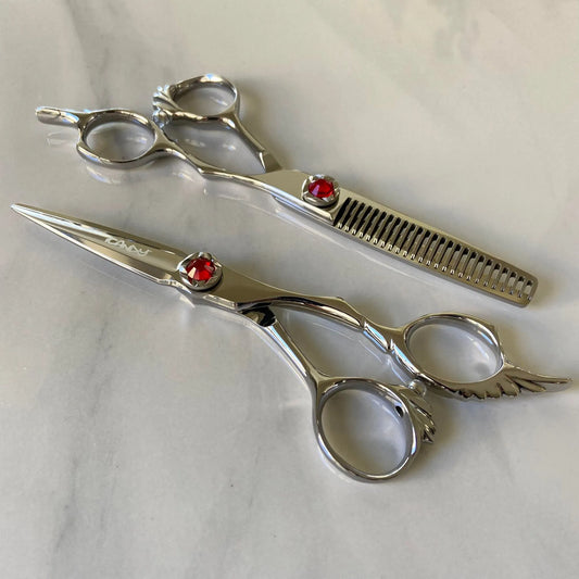 iCandy ANGEL Ice Ruby VG10 professional hairdressing scissors and thinning scissors bundle featuring premium Japanese TAKEFU VG10 steel, ergonomic offset handles, precision convex blades and a distinctive ruby red diamanté tension screw for smooth cutting and controlled texturising.