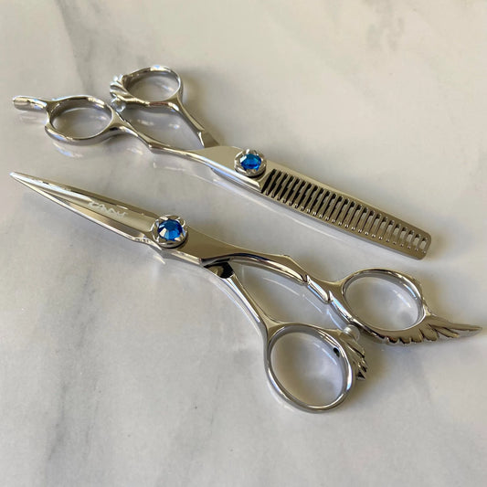iCandy ANGEL Ice Blue VG10 professional hairdressing scissors and thinning scissors bundle featuring premium Japanese TAKEFU VG10 steel, ergonomic offset handles, precision convex blades and a distinctive ice blue diamanté tension screw for smooth cutting and controlled texturising.