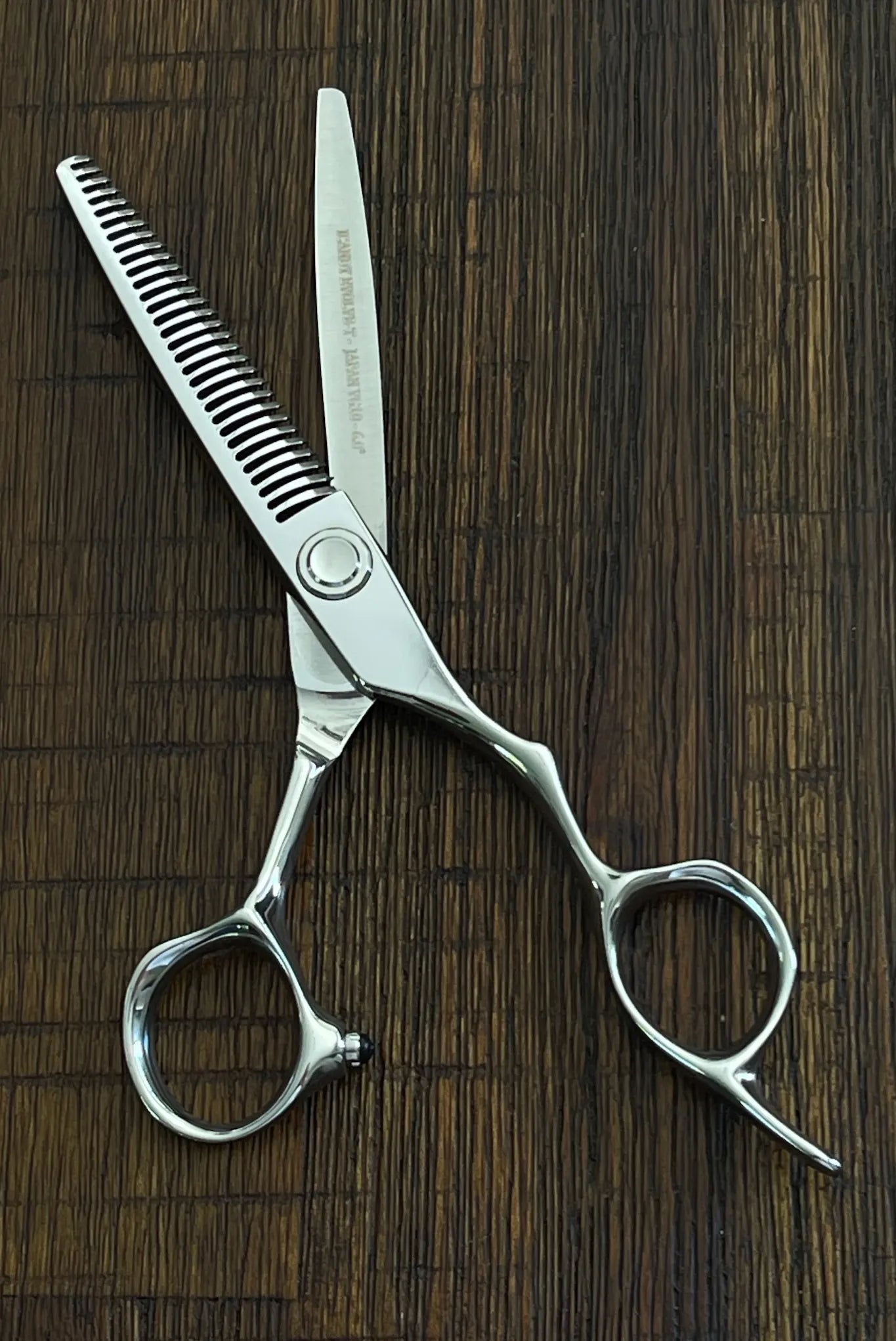 Precision ball bearing tension system on the iCandy EVOLVE Silver VG10 professional hairdressing scissors engineered for exceptionally smooth blade movement, consistent cutting performance and long-term reliability.