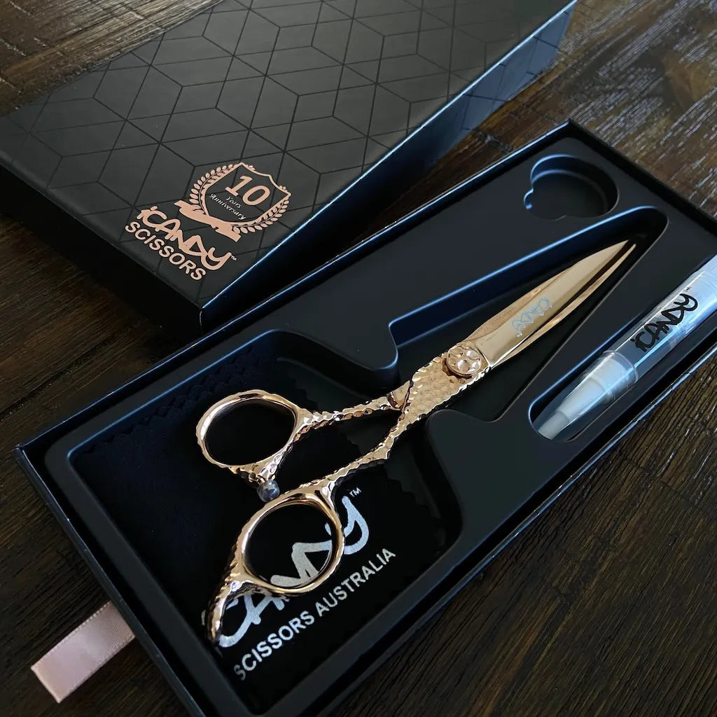 iCandy SWORD PRO Rose Gold VG10 Hairdressing Scissors 6.6 inch Limited Edition presented in the official iCandy premium gift box, handcrafted from Japanese VG10 steel with an artisan hand-hammered handle and luxurious Rose Gold Titanium finish for elite salon performance.