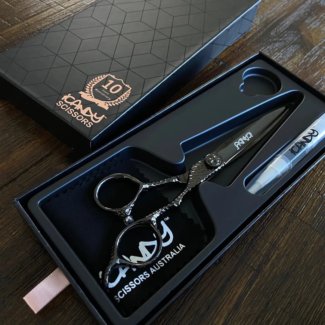 iCandy SWORD PRO Midnight Black VG10 Hairdressing Scissors 6.6 inch Limited Edition presented in the official iCandy premium gift box, handcrafted from Japanese VG10 steel with an artisan hand-hammered handle and Midnight Black Titanium finish for world-class salon performance.

