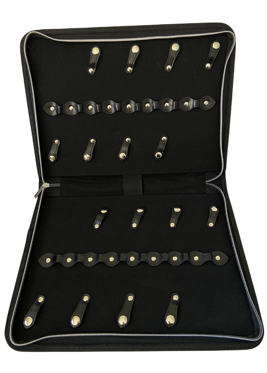 An open iCandy black leather scissor zip case displaying 16 multiple scissor slots. The case features premium buttons and stitching with a iCandy embossed logo.