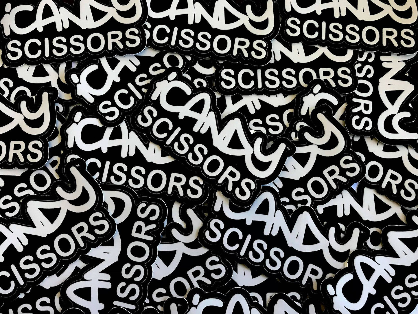iCandy Scissors Logo Multiples on White Background